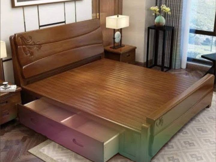 Dormitorio con cama y muebles de madera a medida